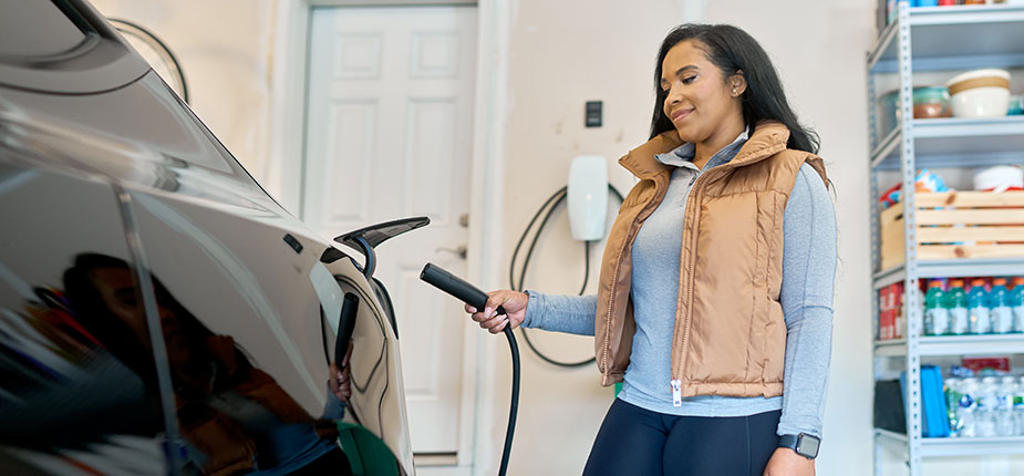 woman using level 2 charger
